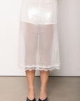 Sequin midi skirt
Lace trim
Back zipper closure
Inner shorts lining
Partially lined/Sheer
white sequin midi skirt
holiday outfit