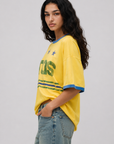 Game on. Keep your eye on the ball in this OS Ringer Tee designed in colors inspired by the Team Brasil jersey. Featuring an athletic influence with rib contrast along the neckline and arms.
Oversized fit and length, accented with dropped shoulders
Available in just one size
Length: 27.5"
Cotton
yellow brazil brasil world cup jersey tee