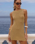 Knit mini dress
Subtle shimmer
Delicate seashell hardware
Boat neck
Slip on style
Unlined/sheer
Lurex/Viscose
gold metallic mini dress
resort wear mini dress
beach vacation outfit