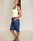 Mid rise jorts shorts
Relaxed and wide leg design
Button fly
Rigid denim does require some time to 'wear in'