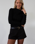 Knit top. Mock neck. Long sleeves. Lettuce edge hems. Unlined. black long sleeve. black ribbed long sleeve. fall top. fall outfit.