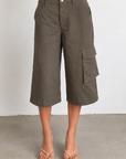 green Bermuda Cargo Shorts
Cargo jorts
Button fly closure
Belt loops
5 pocket construction
Unlined
