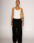 Woven pants
Elastic waist with drawstring closure
Side pockets
Unlined
black linen pants
resort lounge wear
summer pants