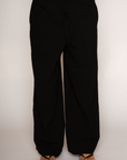 Woven pants
Elastic waist with drawstring closure
Side pockets
Unlined
black linen pants
resort lounge wear
summer pants