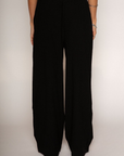 Woven pants
Elastic waist with drawstring closure
Side pockets
Unlined
black linen pants
resort lounge wear
summer pants