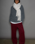 Woven burgundy track pants. Elastic waistband. Side pockets. Side stripes. Unlined. street fashion. trendy track pants