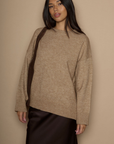 Heather crochet knit sweater. Crewneck. Long sleeves. Banded hems. Unlined. brown sweater. oversized sweater. cute fall sweater. cute winter sweater.