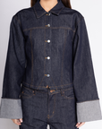 Fitted denim collared jacket
Wide cuffed sleeves
Button down closure
Unlined