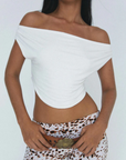 cream Multi-functional top - can be worn off the shoulder or as a halter
Soft, draped silhouette
Partially lined
Lightweight tissue modal
going out top
