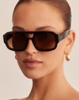The Suki by Banbé are modern aviator sunglasses
Gold embossed Banbé logo on outer left arm
Style details printed in gold foil on inner right arm
Scratch resistant/category 3/polarized lens
100% UV protection
Acetate frame
Includes branded vegan case & cleaning cloth
Designed in Australia
Width: 10.5cm / Lens Height: 5.1cm / Arm Length: 14cm / Nose Bridge: 3.5cm
pink lens sunglasses
tort and pink sunglasses