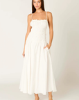 white Smocked maxi dress
Straight neckline
Adjustable spaghetti straps
Gathered bust with tiered smocking
Back cutout detail
Side pockets
Fully lined