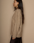 Heather crochet knit sweater. Crewneck. Long sleeves. Banded hems. Unlined. brown sweater. oversized sweater. cute fall sweater. cute winter sweater.