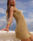 Knit mini dress
Subtle shimmer
Delicate seashell hardware
Boat neck
Slip on style
Unlined/sheer
Lurex/Viscose
gold metallic mini dress
resort wear mini dress
beach vacation outfit