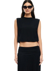 Knit muscle tank. Crewneck. Cropped boxy fit. Elastic hem. Fully lined.