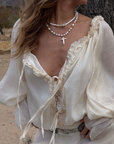 cream Long sleeve chiffon boho mini dress
Ruffle edges
Front ties
Partially lined
coachella outfit
stagecoach outfit
boho mini dress