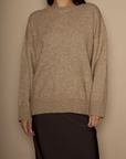 Heather crochet knit sweater. Crewneck. Long sleeves. Banded hems. Unlined. brown sweater. oversized sweater. cute fall sweater. cute winter sweater.
