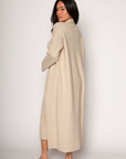 Ribbed knit longline cardigan. Open front. Long sleeves. Unlined. Ribbed knit maxi dress. Strapless elastic folded neckline. Back slit. Unlined. tan dress cardigan set