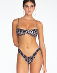 Leopard printed bralette bikini top
Edged with a delicate ruffle
Wear as a sweet bikini or delicate bralette