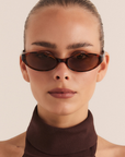 Oval slimline sunglasses
Sleek profile and lightweight acetate frame
Polarised, scratch-resistant Category 3 lenses
100% UV protection
Gold foil style detailing on inner right arm
