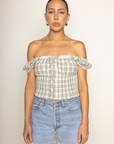 green Woven plaid top
Faux front button
Adjustable front tie
Lace bust trim detail
Smocked shoulder sleeves and back
Side zipper
Unlined
summer top
spring top