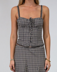 Plaid woven bustier top. Adjustable straps. Drawstring front closure. Front button down closures. Side zipper closure. Elastic smocked back panel. Fully lined. fall top. gingham top. thanksgiving outfit. friendsgiving outfit. fall outfit