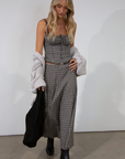 Plaid woven bustier top. Adjustable straps. Drawstring front closure. Front button down closures. Side zipper closure. Elastic smocked back panel. Fully lined. fall top. gingham top. thanksgiving outfit. friendsgiving outfit. fall outfit