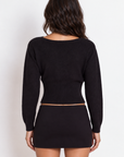 black Knit low rise mini skirt
Inner short lining
Elastic waistband