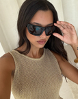 Knit mini dress
Subtle shimmer
Delicate seashell hardware
Boat neck
Slip on style
Unlined/sheer
Lurex/Viscose
gold metallic mini dress
resort wear mini dress
beach vacation outfit