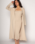 Ribbed knit longline cardigan. Open front. Long sleeves. Unlined. Ribbed knit maxi dress. Strapless elastic folded neckline. Back slit. Unlined. tan dress cardigan set