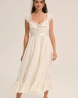 Cotton midi dress
Includes a romper liner
Center-front button closure
Lace trims
Satin ribbon details
white ivory summer mini dress
countryside midi dress
bridal midi dress