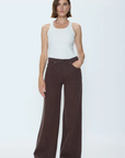 Mid-rise fit designed to sit lower on the hips for a relaxed, low-slung feel.
Full-length silhouette
32" inseam
Crafted from rigid denim, this style will naturally soften and relax over time.
brown denim jeans