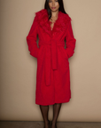 Faux sherpa longline coat. Faux fur collar neckline. Front snap button closure. Tie waist. Side pockets. Back slit. Fully lined. red fur coat. fall outfit. cute winter coat. trendy winter coat.