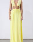 Crinkle woven sleeveless maxi dress. Waist cut outs. Side slits. Back tie closure. Back drawstring waist closure. Partially lined. vacation dress. beach dress. yellow maxi dress.