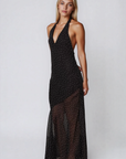Polka dot halter maxi dress
V-neckline
Adjustable neck tie
Low back
Asymmetrical sheer hemline
Partially unlined/Sheer
black and white polka dot maxi dress