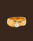 Pave 18k gold plated non-tarnish pearl band ring. Not adjustable.
gold ring with pearl
