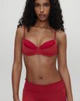 red Underwire bikini top
Ruffle neckline
Adjustable shoulder straps and back ties
Chiffon fabric over bust