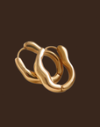 18K gold non-tarnish wavy oval hoop earring
18K gold plating stainless steel
Measurement (L x W inch): 1 x 0.8
Lead and Nickel Free
Hypoallergenic
Water Resistant