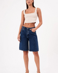 Mid rise jorts shorts
Relaxed and wide leg design
Button fly
Rigid denim does require some time to 'wear in'