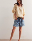 blue Denim cut-off shorts silhouette
Low-slung
Slouchy wide fit
Pull-on design
Drawcord waist detail
Oversized pouch pockets
Raw-edge hem
Cotton