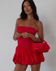 Sleeveless dress. Knit bodice. Woven bubble skirt. Elastic hem. Fully lined. red bubble dress. red mini dress. red mini bubble dress. summer dress. going out dress