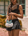 Woven tiered skirt. Elastic waist with drawstring closure. Shorts lining. Black mini skirt. skirt for summer. summer outfit. summer skirt. black skort. cute summer outfit