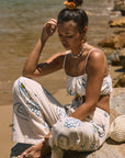 Printed woven wide leg pants. Elastic waistband with drawstring closure. Side pockets. Fully lined. lemon pant. grape and wine pant. summer throw on pant. cute graphic linen pant. european summer pant. summer pant. vacation outfit. cute summer set.