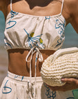 Printed woven cropped tank top. Adjustable straps. Drawstring hem. Elastic back. Fully lined. lemon top. lemon shirt. summer crop tank top. cute graphic tank top. european summer top. summer top. vacation outfit. cute summer set.
