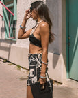 Printed woven chiffon skirt. Side hook and eye and zipper closure. Tie waist. Beaded waist strap. Fully lined. beach cover up. beach skirt cover up. vacation outfit. european summer outfit. black and white skirt. summer skirt. mexico outfit.