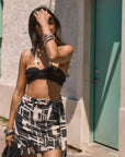 Printed woven chiffon skirt. Side hook and eye and zipper closure. Tie waist. Beaded waist strap. Fully lined. beach cover up. beach skirt cover up. vacation outfit. european summer outfit. black and white skirt. summer skirt. mexico outfit.