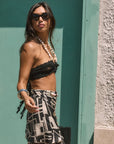 Printed woven chiffon skirt. Side hook and eye and zipper closure. Tie waist. Beaded waist strap. Fully lined. beach cover up. beach skirt cover up. vacation outfit. european summer outfit. black and white skirt. summer skirt. mexico outfit.