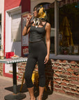 Woven crop top. Fixed straps. Front hook and eye closures. Lace trim. Side zipper closure. Fully lined. blank tank top. black crop top tank top. top that hooks in the front. black corset top. going out top. european summer outfit. european summer top. vaction outfit.