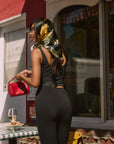 Woven crop top. Fixed straps. Front hook and eye closures. Lace trim. Side zipper closure. Fully lined. blank tank top. black crop top tank top. top that hooks in the front. black corset top. going out top. european summer outfit. european summer top. vaction outfit.