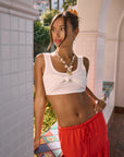 Woven tiered midi skirt. Elastic waist with drawstring closure. Partially lined. red maxi skirt. red midi skirt. red ruffle skirt. red flowy skirt. beach cover up. beach skirt cover up. beach vacation outfit. summer vacation skirt. european summer skirt. european summer outfit. european summer inspo