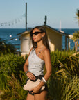 Woven top. Asymmetric neckline. Elastic steps. Beaded details. Ruched side. Side zipper closure. Fully lined. blue tank top. blue asymmetrical tank top. tank top with beads. summer outfit. summer going out top. beach vacation outfit. beach vacation top. fancy dinner top. european summer outfit. european summer top. european summer outfit inspo. vacation outfit